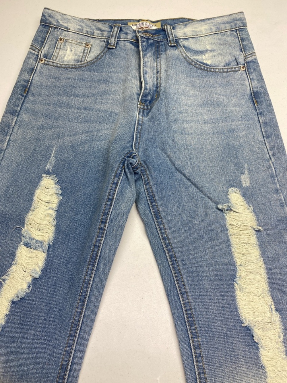 Distressed Light Blue Straight-Leg Jeans